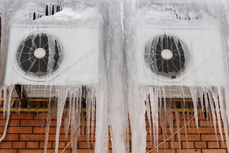 Why Air Conditioners Freeze Up. Frozen AC unit.